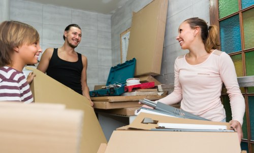 Removal team preparing a Dulwich house move with boxes and furniture