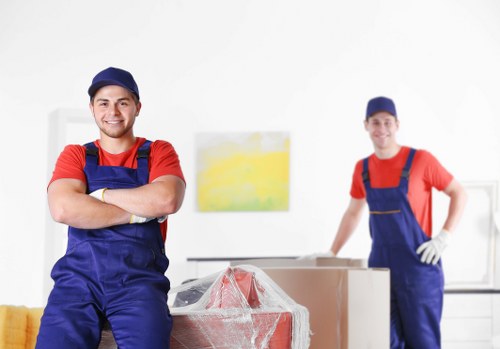 Packing boxes and wrapping household items in a Dulwich home