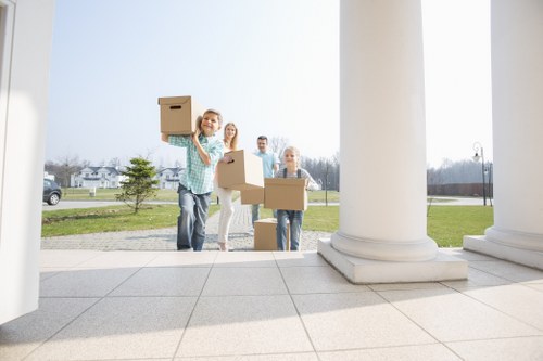 Packed moving boxes and household items ready for transport
