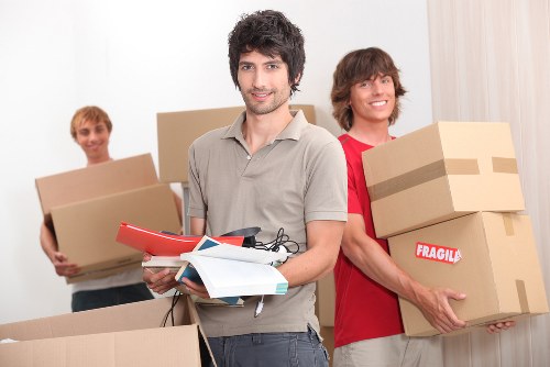 Professional furniture moving team handling bulky items in Dulwich