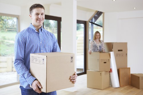 Packed household boxes and furniture prepared for transport in Dulwich