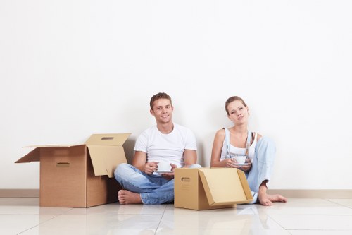 Loading furniture into a moving van during a local man with van service