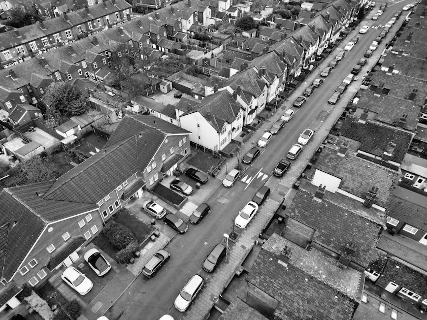 A narrow residential street in West Dulwich showing a white van parked on a cobbled road, which is part of a home relocation and furniture transport process managed by Man with Van Dulwich. The street